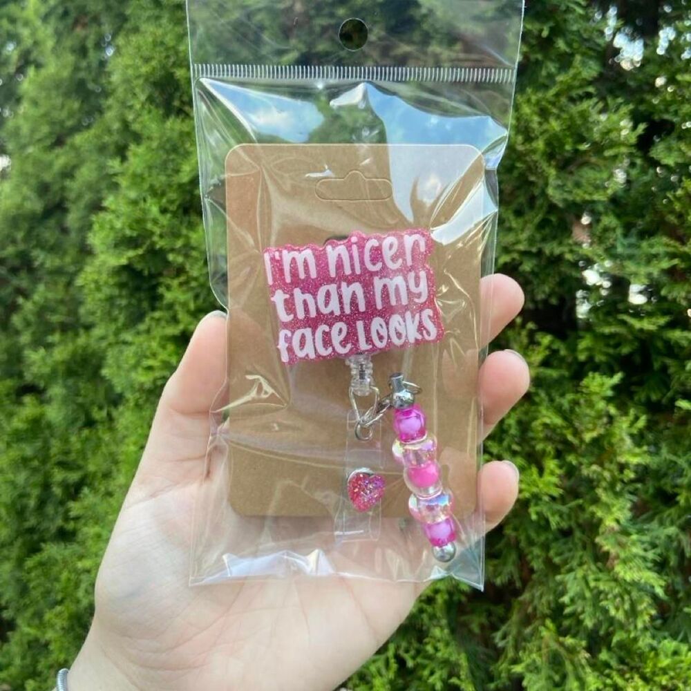 Im Nicer Than My Face Looks Badge Reel
